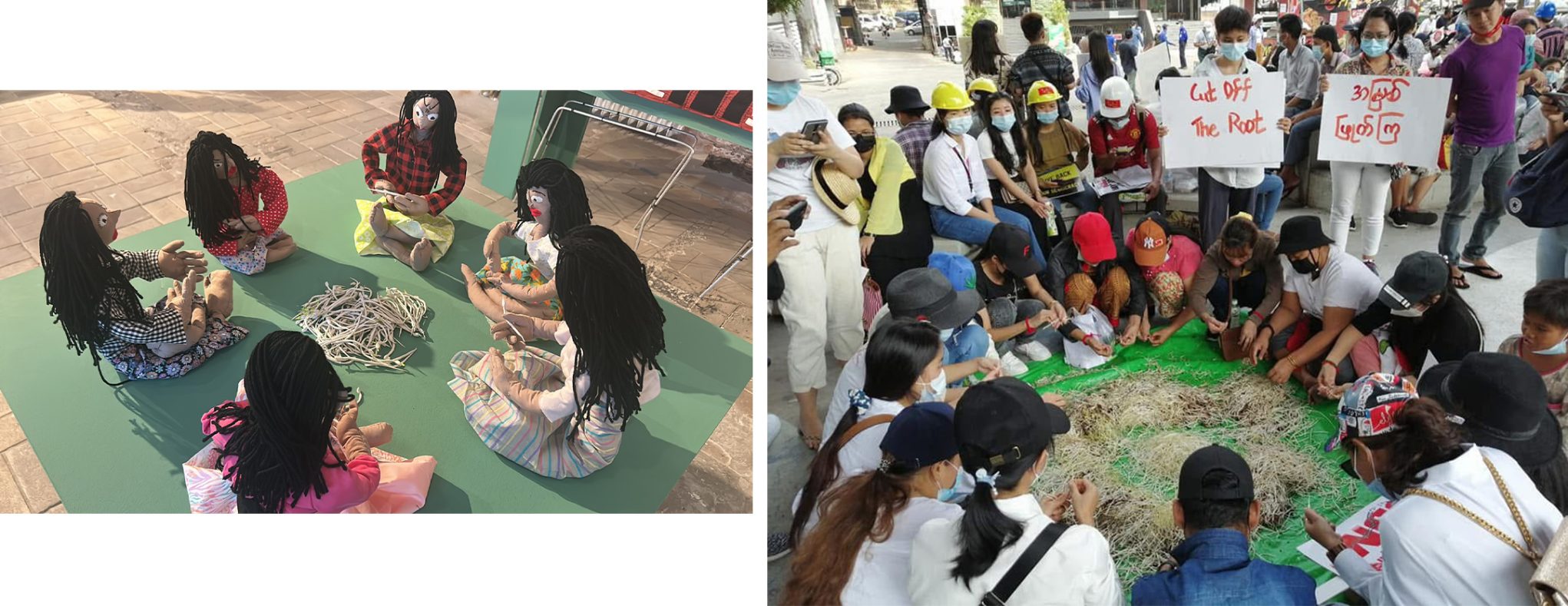 Art installation of dolls weaving strings beside crowd crafting on green tarp, Cut Off The Root protest signs.