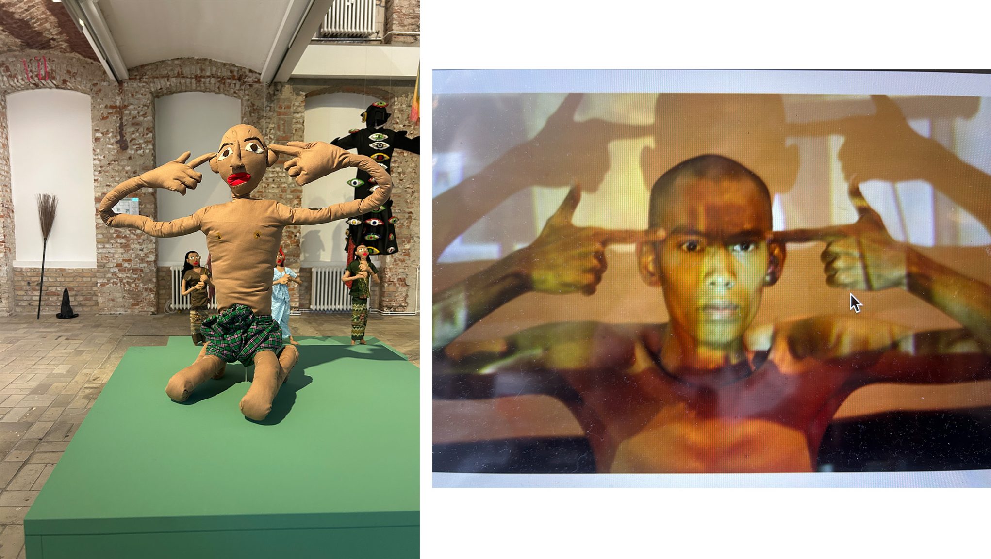 Contemporary art installation: large fabric sculpture kneeling, fingers to temples, dolls and video projection in gallery.