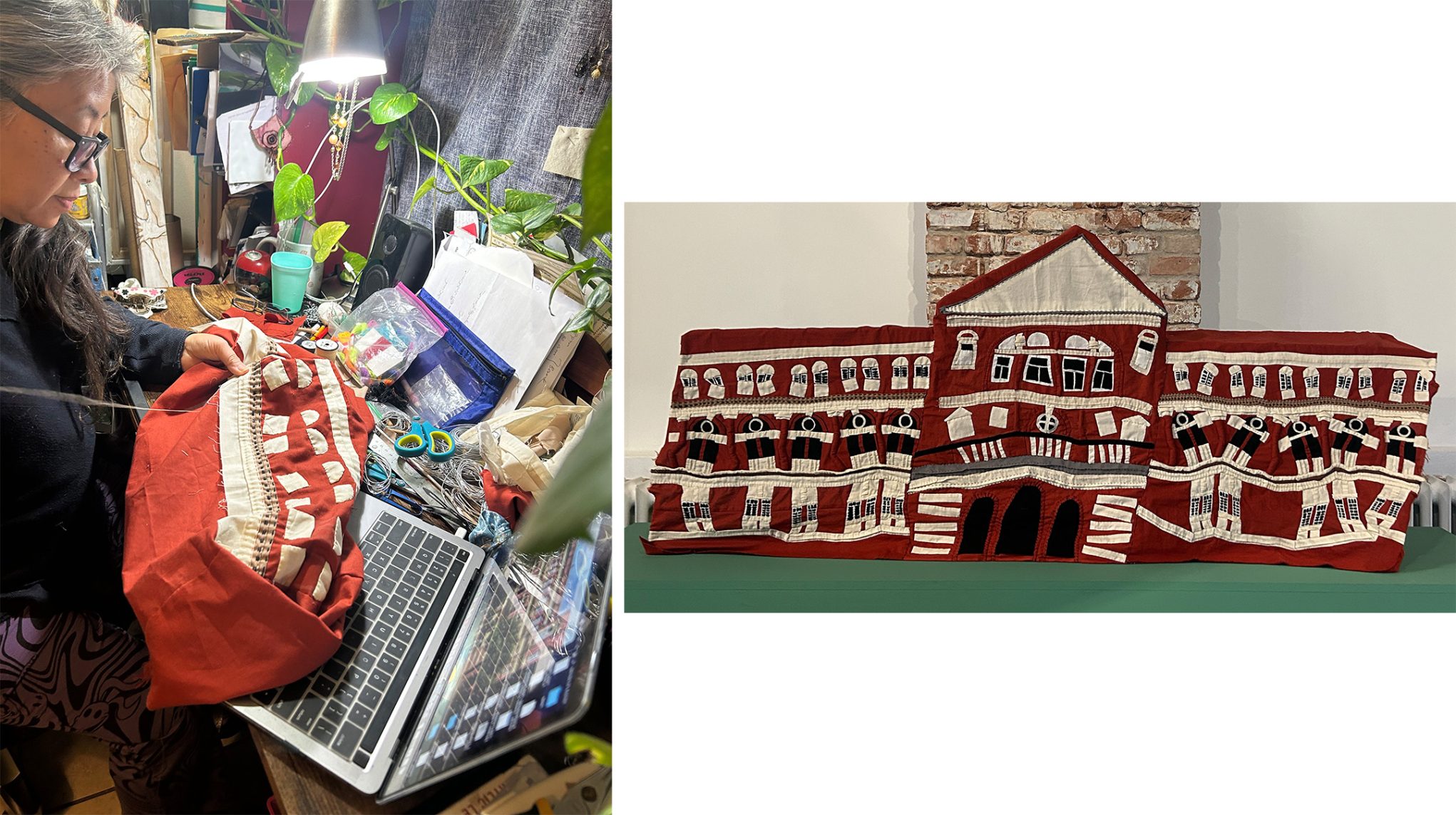 Artist sewing red-and-white architectural quilt in studio; handmade textile art of historic building displayed on table.